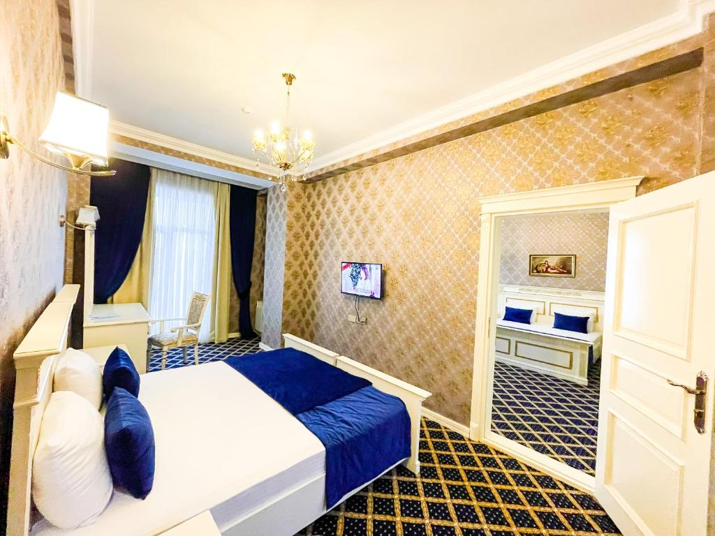 Premier Palace Hotel Connect otaq (4 nəfərlik) otağı - Bakı şəkil 1